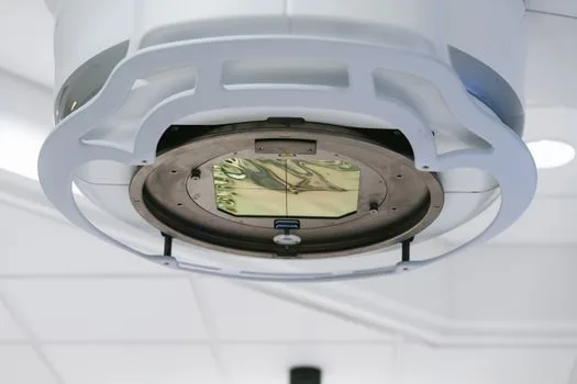 Close-up of sophisticated medical imaging equipment in a laboratory setting.